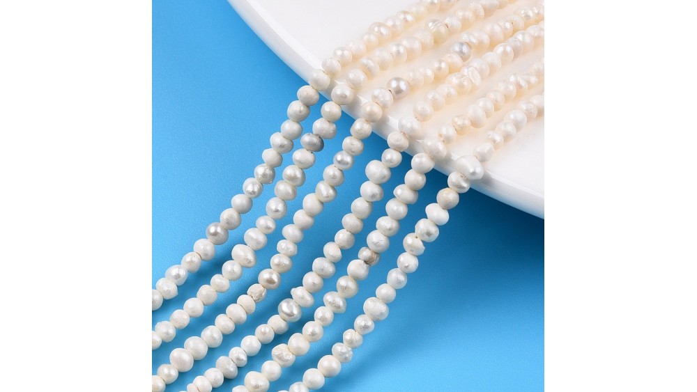 Petites perles fines en nacre d'eau douce 2.5mm par lot de 50