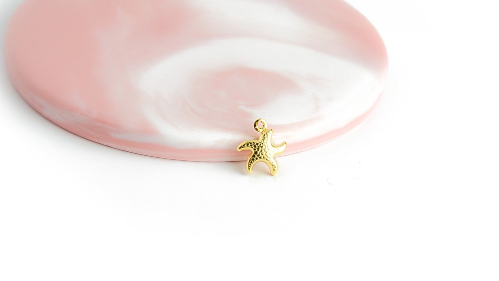 Pendentif étoile de mer acier inoxydable or