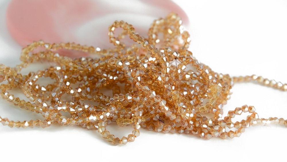 copy of Perles  toupies à facettes 3x3.5mm transparent AB