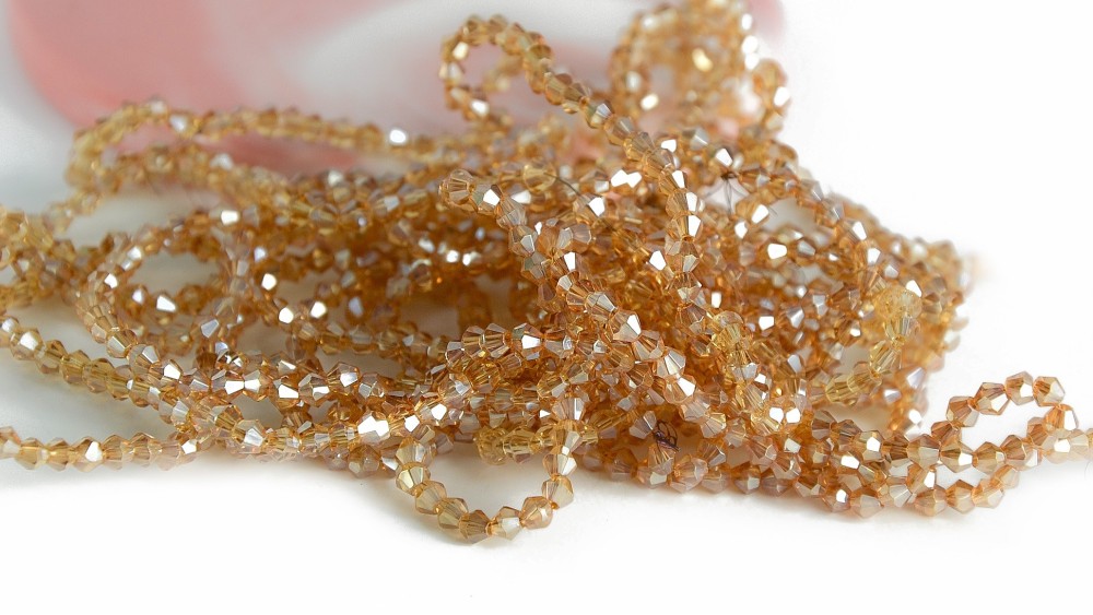 copy of Perles  toupies à facettes 3x3.5mm transparent AB