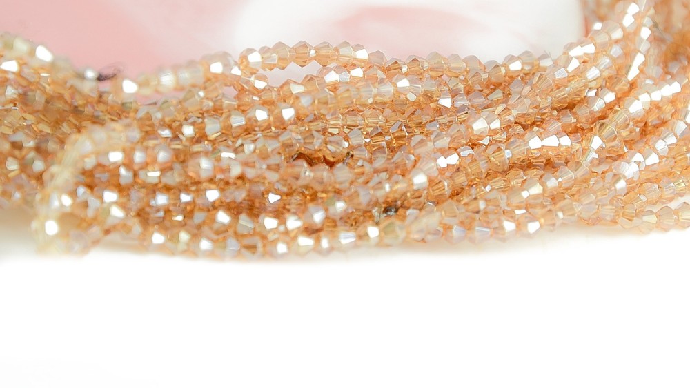 copy of Perles  toupies à facettes 3x3.5mm transparent AB