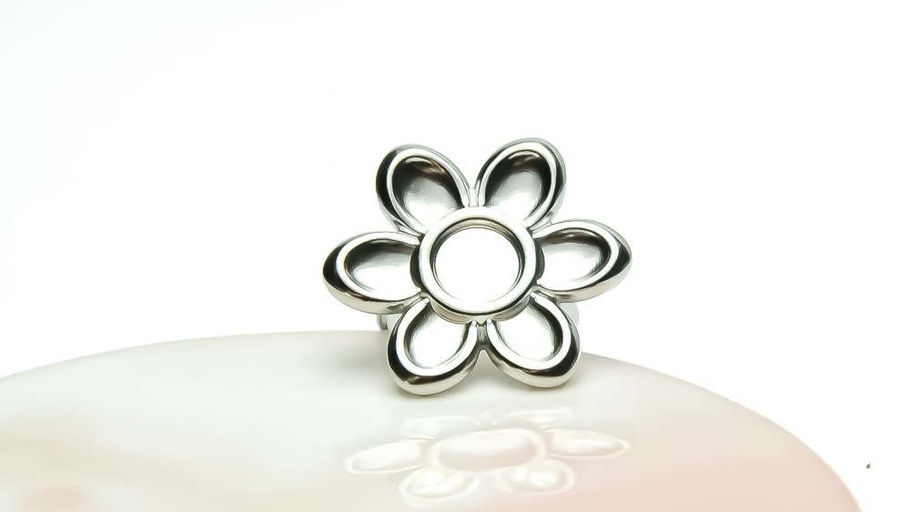 bague fleur acier