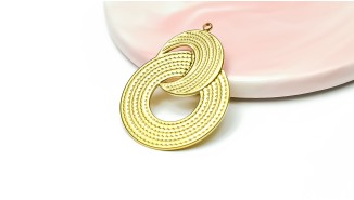 Grand pendentif volute acier inoxydable plaqué or 18k