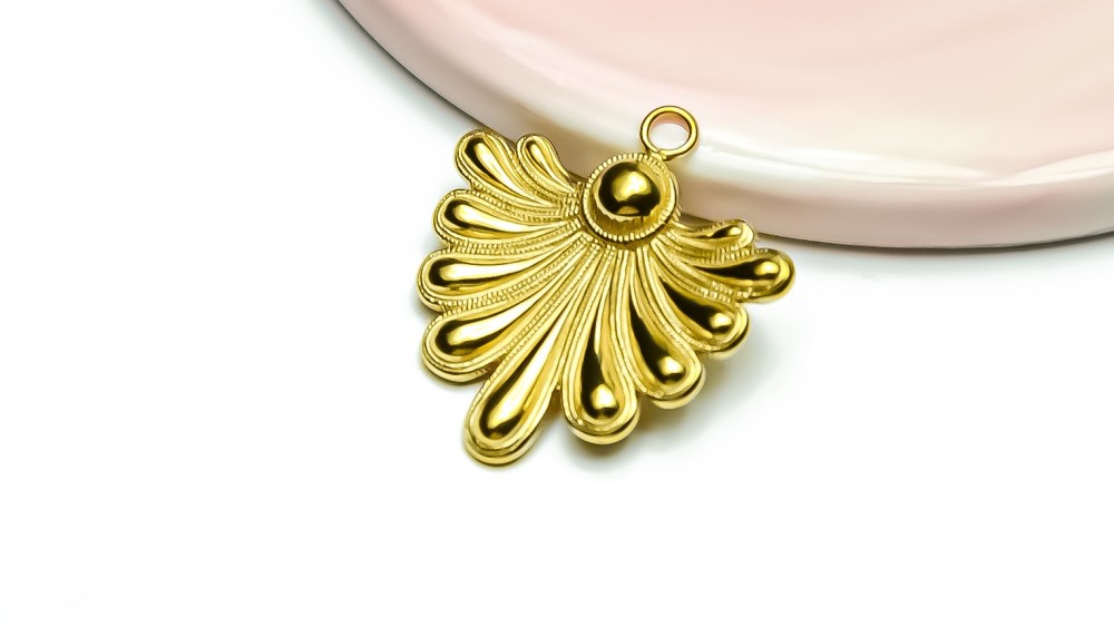 Pendentif feuille ou volute acier inoxydable plaqué or 18k