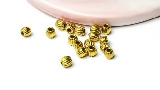 10 Perles 5mm intercalaires à stries acier inoxydable plaqué or 18k