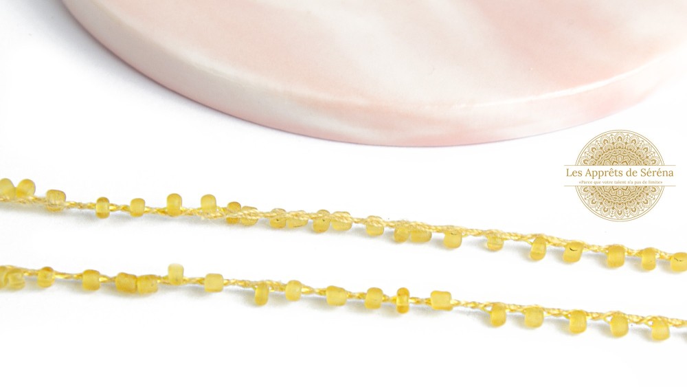 Fil coton perlé de rocailles or translucide 2mm