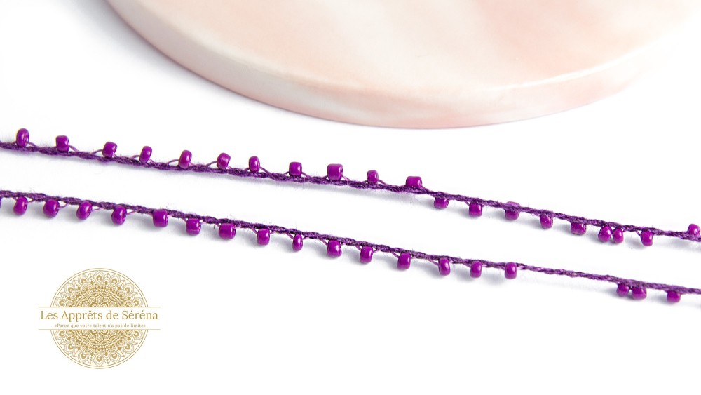 Fil coton perlé de rocailles violettes 2mm