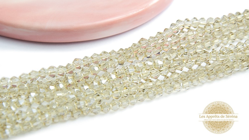 Perles toupies à facettes 3x3.5mm champagne