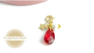 Pendentif goutte acier inoxydable doré et verre à facettes