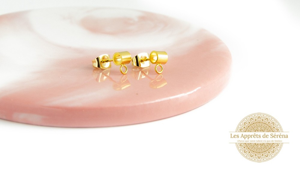 Attache puces d'oreille avec bélière