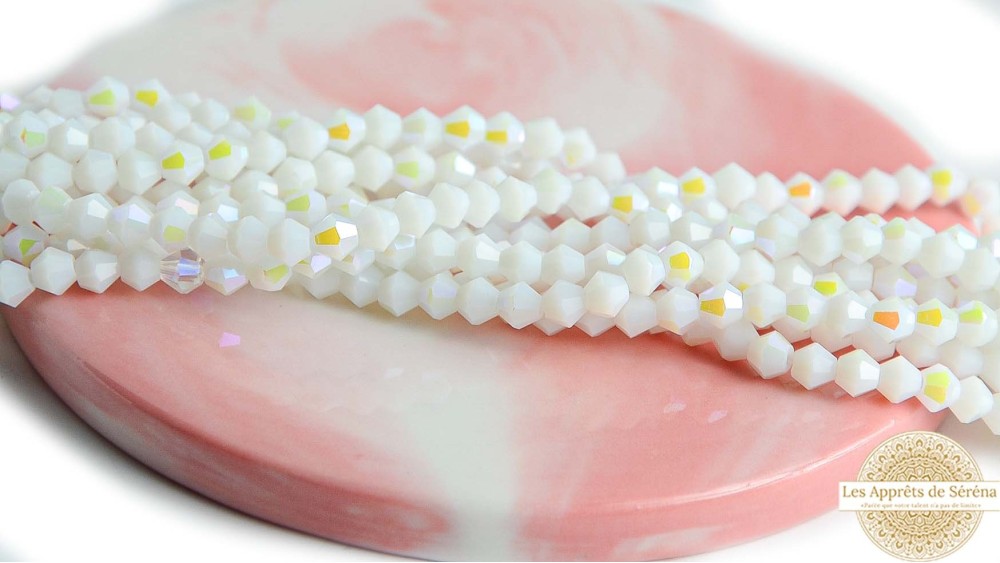 Perles toupie verre en 4mm blanche AB