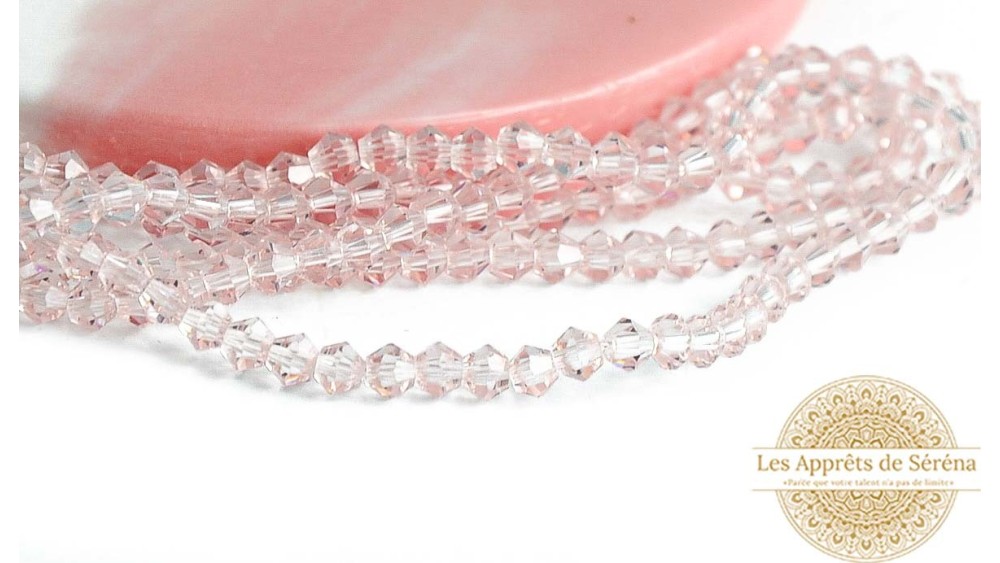 Perles  toupies à facettes 3x3.5mm transparent AB