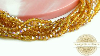 Rang de perles toupie de 3mm en verre topaze AB pour création fines